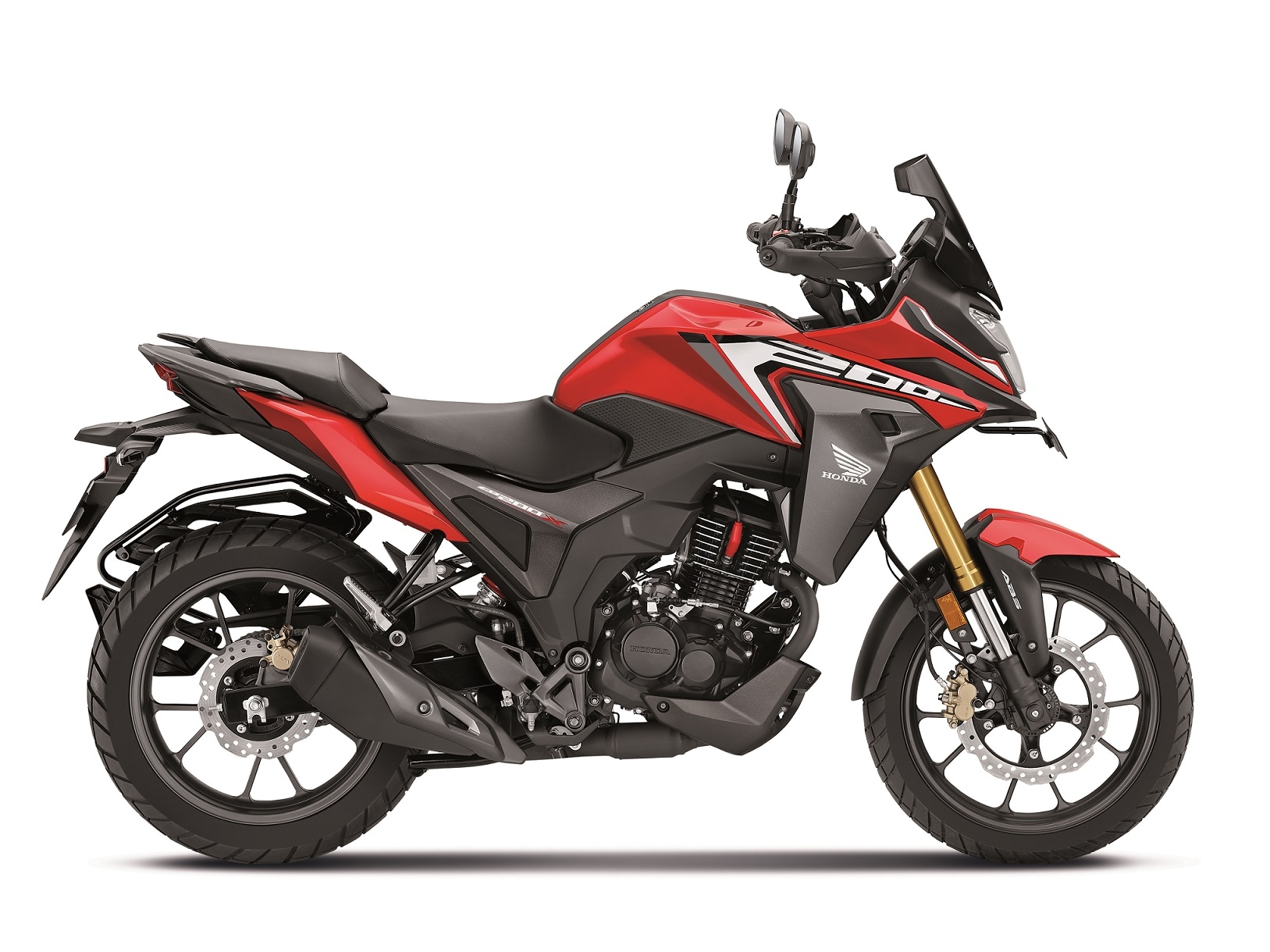 The Honda CB200X gets a fairing and knuckle guard for more adventure-oriented styling