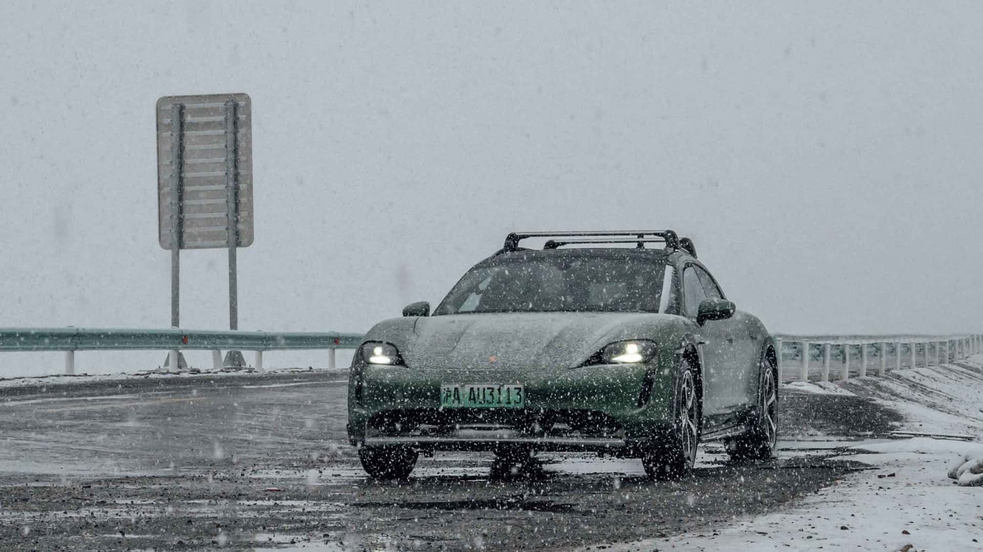 The electric Porsche's journey along the Xinjiang-Tibet route features desolate regions with extreme weather and road conditions.