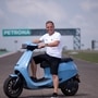 Former world champion Loris Capriossi takes Ola electric scooter for a spin on BIC tracks