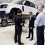 File photo: UK Prime Minister, Rishi Sunak, (C) visits Land Rover for an announcement on a new electric car battery factory in July of 2023. (via REUTERS)