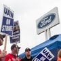Members of the United Auto Workers (UAW) picket outside Ford Motor's plant in Michigan. (AFP)