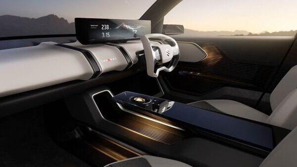 The images of the eVX interior have been shared online by Japanese media ahead of the global debut later this month. The images show a sleek dashboard with a large free-standing digital screen that stretches from the centre to the driver's side. (Image courtesy: CarWatch) The images of the eVX interior have been shared online by Japanese media ahead of the global debut later this month. The images show a sleek dashboard with a large free-standing digital screen that stretches from the centre to the driver's side. (Image courtesy: CarWatch)