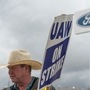 Members of the United Auto Workers (UAW) picket outside of the Michigan Parts Assembly Plant. Ford and General Motors said around 500 more workers have been temporarily laid off due to knock-on effects from the ongoing strike at Detroit's Big Three automakers. (File photo) (AFP)
