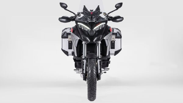 The new Multi V4 Rally gets increased suspension travel to 200 mm at both ends, up from 170 mm (front) and 180 mm (rear) on the Multistrada V4 S. A larger sump guard offers better underbelly protection and Ducati will offer different seat and suspension options helping alter the ride height from 805 mm to a tall 905 mm. The new Multi V4 Rally gets increased suspension travel to 200 mm at both ends, up from 170 mm (front) and 180 mm (rear) on the Multistrada V4 S. A larger sump guard offers better underbelly protection and Ducati will offer different seat and suspension options helping alter the ride height from 805 mm to a tall 905 mm.