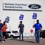 United Auto Workers (UAW) members walk off to join the strike outside of Ford's Kentucky Truck Plant in Louisville, Kentucky. The union has been on strike against Detroit's Big Three, which also includes GM and Stellantis, for more than a month now. (via REUTERS)