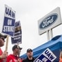 Members of the United Auto Workers (UAW) picket outside of the Michigan Parts Assembly Plant in Wayne, Michigan. The US auto workers union announced a tentative agreement with Ford late on October 25, a breakthrough in a 41-day stoppage on Detroit's Big Three car manufacturers. (File photo) (AFP)