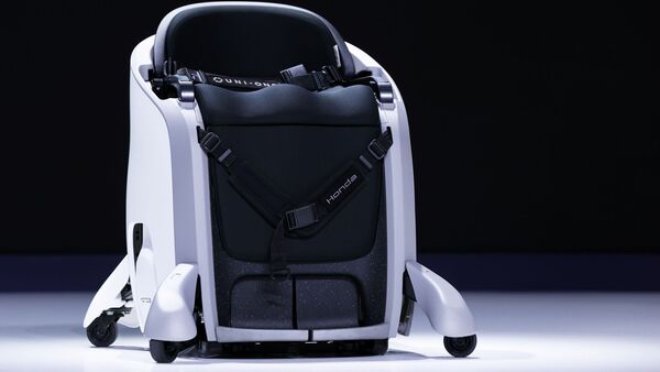 Honda Motor has displayed the UNI-ONE personal mobility concept at the ongoing Japan Auto Show, Users can steer this concept vehicle simply by shifting their body weight while sitting without using hands and thus perform certain tasks while moving. It has been designed to expand opportunities for users with mobility challenges. Honda Motor has displayed the UNI-ONE personal mobility concept at the ongoing Japan Auto Show, Users can steer this concept vehicle simply by shifting their body weight while sitting without using hands and thus perform certain tasks while moving. It has been designed to expand opportunities for users with mobility challenges.