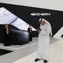 File photo: An attendee films near the pavilion of Chinese auto company Chery Automobile on the opening day of the Geneva International Motor Show in Doha, Qatar. (Bloomberg)