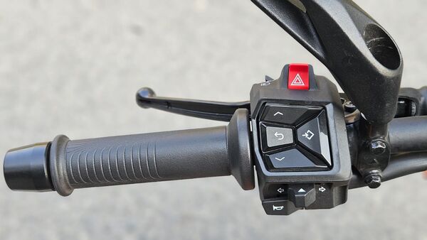 There is new switchgear which looks more premium and provides good feedback even if the rider is wearing gloves. The buttons on the left switchgear are used to control the instrument cluster. There is a hazard switch on the left switch cube as well. There is new switchgear which looks more premium and provides good feedback even if the rider is wearing gloves. The buttons on the left switchgear are used to control the instrument cluster. There is a hazard switch on the left switch cube as well.