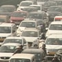 Vehicles stuck in a traffic jam on Delhi-Gurugram Expressway amid low visibility due to smog during a winter morning. Delhi will see the return of Odd-Even rule from November 13. (PTI)