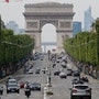 Cars drive on the Champs Elysee avenue in Paris. The French capital's mayor says her city has too many SUVs, so she’s asking voters to decide on parking fee hike on February 4, 2024. (AP Photo/Christophe Ena, File) (AP)