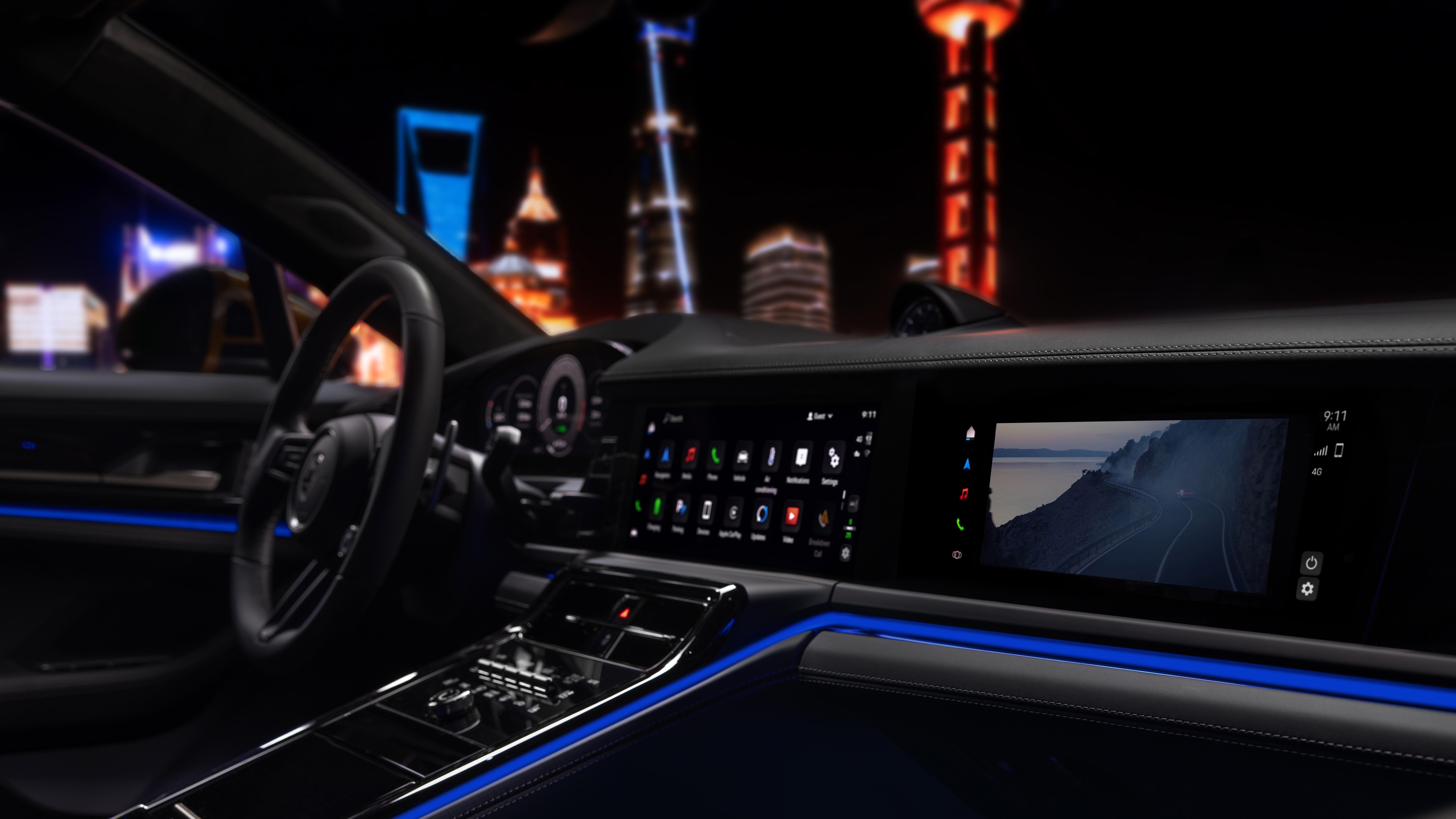 The Porsche Panamera's cabin borrows its steering wheel from the all-electric Taycan, while there's a new optional display for the front passenger as well 2024 Porsche Panamera