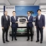 Bollywood actor Shah Rukh Khan with officials of Hyundai Motor India at the handover ceremony of his brand new Ioniq 5 EV.