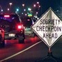 A sign warns motorists as they approach a sobriety checkpoint in Ohio. US auto safety regulators say they have taken the first step toward requiring devices in vehicles that prevent drunk or impaired driving. (AP)