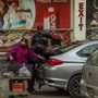 File photo for representational purpose: Customers load their groceries in the boot of a car in Karachi, Pakistan. (Bloomberg)