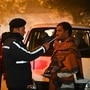 Delhi Traffic Police officials seen checking for drunk driving on the eve of New Year at Gole Market in New Delhi. (Photo by Sanchit Khanna/ Hindustan Times) (Hindustan Times)