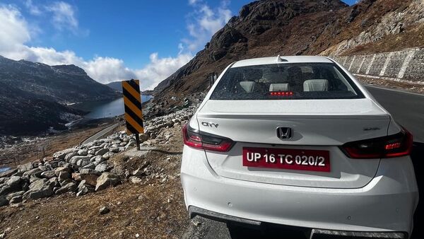 The Honda City is parked next to a road overlooking the extremely scenic Tsongmo Lake. Honda City