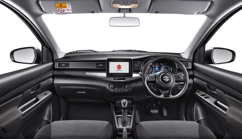 The 2024 Suzuki Ertiga Cruise Hybrid gets a black and grey dual-tone cabin and is packed on the feature front 2024 Suzuki Ertiga Cruise Hybrid