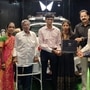 Indian chess prodigy Praggnanandhaa Rameshbabu seen with his family while receiving the Mahindra XUV400 electric SUV as a gift for reaching the finals of the chess world cup last year.