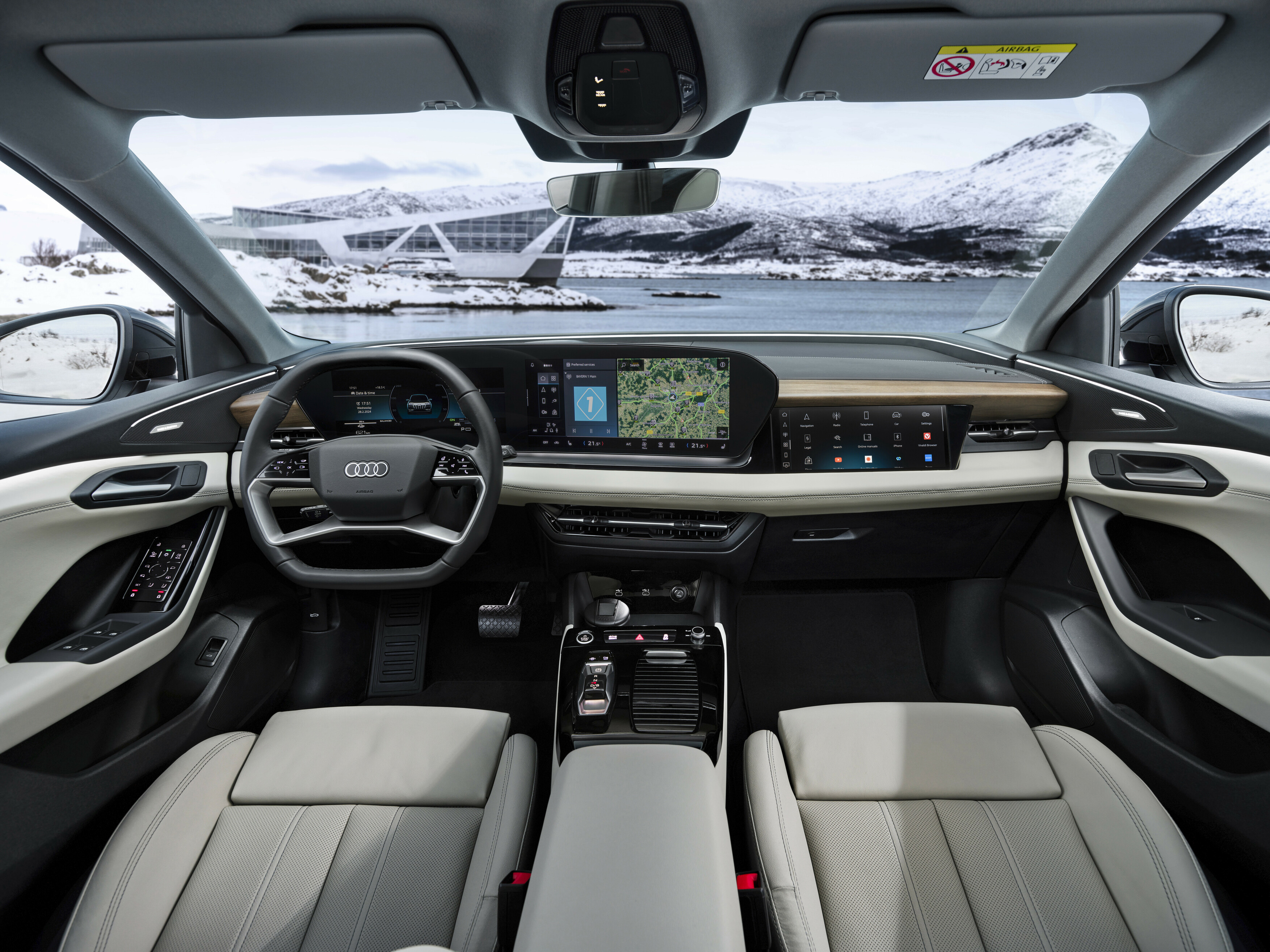 The 2025 Audi Q6 e-tron gets a 14.5-inch central curved infotainment display and a new 10.9-inch touchscreen unit for the front passenger 2025 Audi Q6 e-tron
