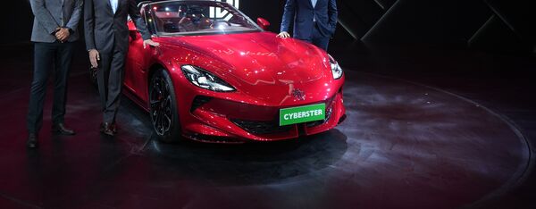 mg cyberster ev, rival to tesla roadster, makes debut in india