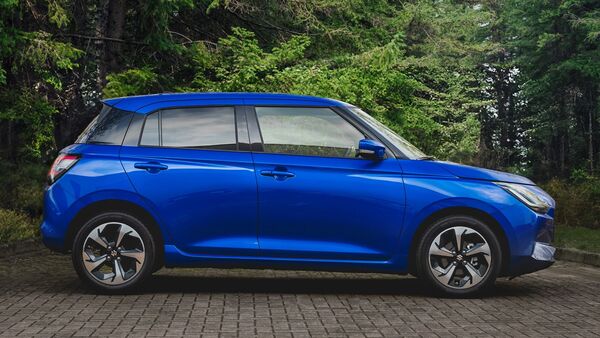 From the side profile, it can be noticed that Suzuki has retained the iconic silhouette of the Swift. However, the new model does look sharper and the company has brought back the rear door handles on the doors intead of the C-pillars. From the side profile, it can be noticed that Suzuki has retained the iconic silhouette of the Swift. However, the new model does look sharper and the company has brought back the rear door handles on the doors intead of the C-pillars.