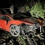 WHat was once a shiny Red Lamborghini Huracan capable of grabbing spotlight even when standing still is now a mangled heap of pity. (West Vancouver Police Department)