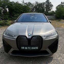 The BMW iX50 was launched early 2024 as a more capable variant of the iX40. It has a bigger battery at its core which promises an increased range, plus some serious performance credentials. There, however, is not much to differentiate this variant from the iX40 model.