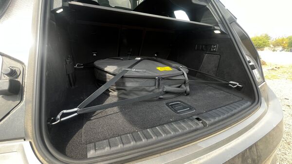 Cargo area inside the BMW iX50 is at 500 litres which is adequate. But the spare wheel plonked here eats into the majority of space.