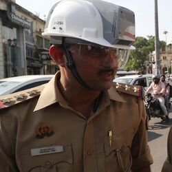 Lucknow Traffic Police personnel wearing AC helmets during a trial run conducted at Hazratganj in Lucknow on April 22. (Deepak Gupta/HT Photo)