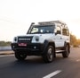 The Force Gurkha continues to have a very strong road presence regardless of whether it is driving forward or just standing still. It continues to be influenced by the Mercedes G Wagon and is appears proud of it.