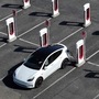 Despite disbanding the entire Supercharger team, Tesla has reaffirmed its commitment to increase EV charging network in the United States. (Getty Images via AFP)