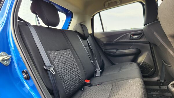 Space at the rear of the Swift is satisfactory for two adults with decent amount of kneeroom and headroom. Under-thigh support, however, could have been better. But a third adult here will make things very uncomfortable. This is also because the center console eats into feet space in the middle.