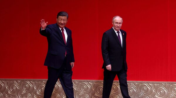 File photo of Chinese President Xi Jinping (left) with Russian President Vladimir Putin. Vladimir Putin