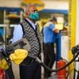 File photo: A man looks at the counter as a vehicles is filled with fuel at a petrol pump in New Delhi, India. (HT_PRINT)