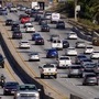 New vehicles sold in the U.S. will have to average about 38 miles per gallon of gasoline in 2031 in real-world driving, up from about 29 mpg this year, under new federal rules unveiled Friday, June 7, 2024, by the Biden administration. President Joe Biden has set a goal that half all of new vehicles sold in the U.S. in 2030 are electric. (AP Photo/Mark J. Terrill, File)