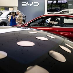 Customers look at electric vehicles at a BYD Co. showroom, operated by Schiller Auto, in Budapest, Hungary.