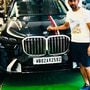 Cricketer Wriddhiman Saha shared an image as he posed with his new BMW X7 finished in Sapphire Black (Instagram/Wriddhiman Saha)