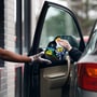File photo used for representational purpose: A worker at McDonalds hands a customer a Happy Meal at a drive-through in Augusta, 