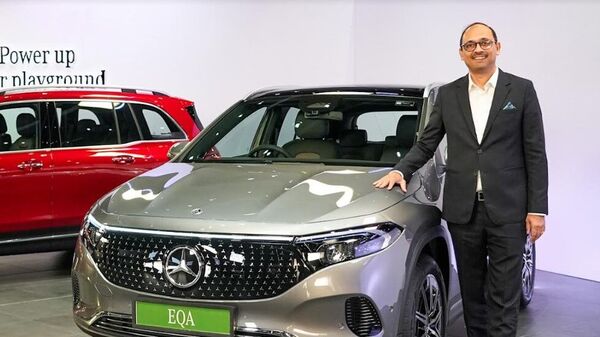 Santosh Iyer, MD and CEO at Mercedes-Benz India, with the EQA electric SUV. EQA is the smallest and most-affordable all-electric model from Mercedes-Benz.