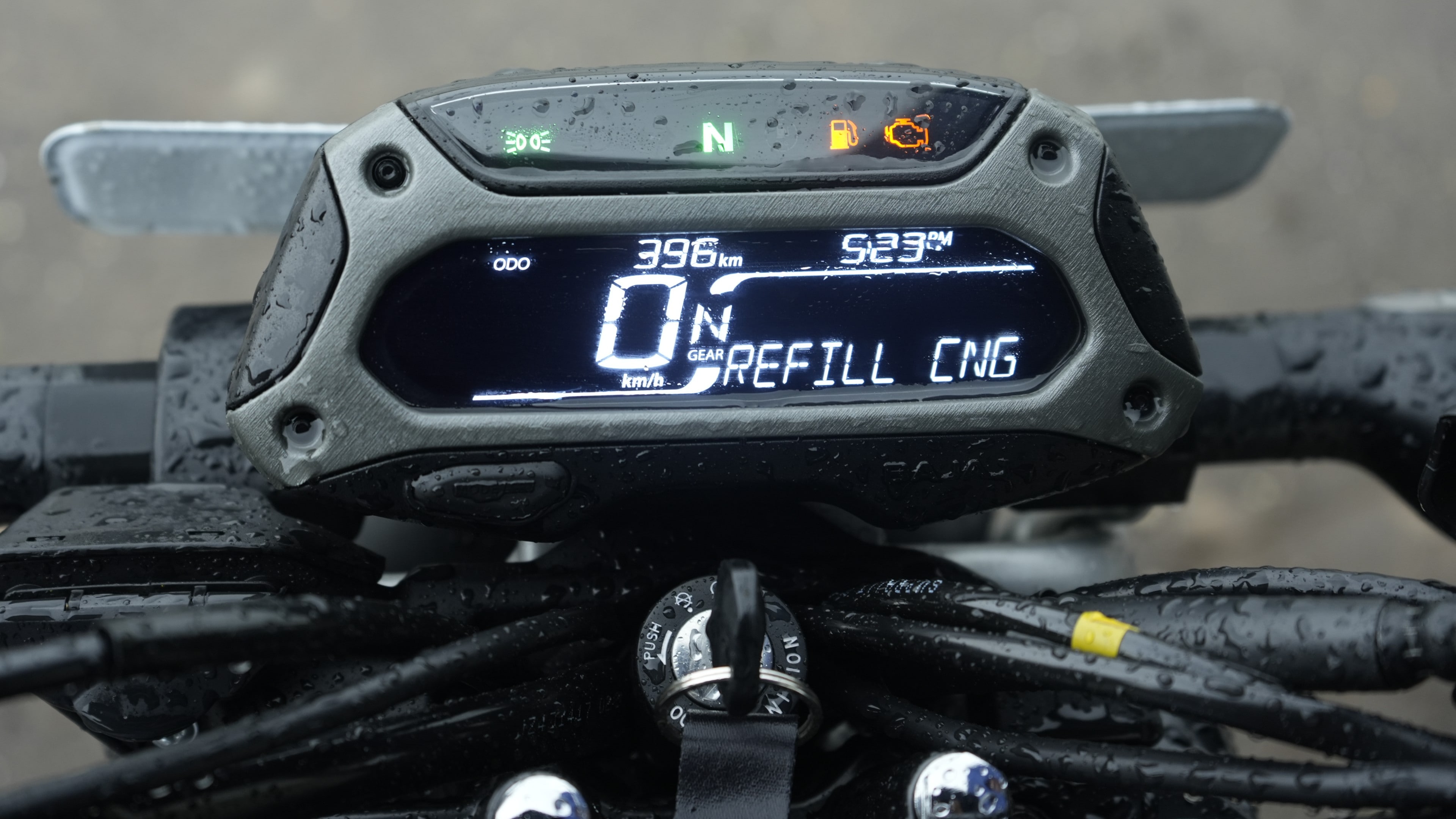 The digital console on the top trim is easy to read and well laid out. It also gets several tell-tale lights for petrol and CNG modes. The bike also gets an Integrated Starter Generator for a silent start Bajaj Freedom 125 CNG Review