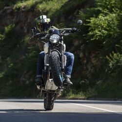 The ergonomics of the Guerrilla 450 are different than the Himalayan. They are more aggressive to provide a bit more leverage to the rider. The handlebar is lower and the foot pegs are rear set.