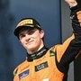 McLaren's Australian driver Oscar Piastri reacts on the podium after the Formula One Hungarian Grand Prix at the Hungaroring race track in Mogyorod near Budapest on July 21, 2024. (AFP)
