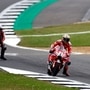 Ducati Lenovo Team's Italian rider Enea Bastianini (R) beats Prima Pramac Racing's Spanish rider Jorge Martin (L) to win the MotoGP race of British Grand Prix at Silverstone circuit in Northamptonshire, central England, on August 4, 2024. (AFP)