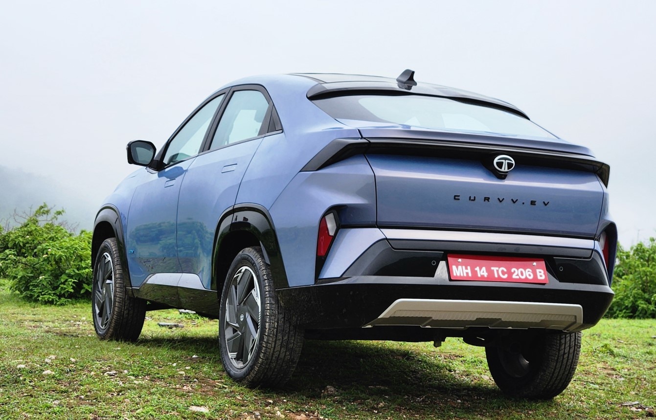 The small rear glass on the trunk door significantly hinders view from the rear-view mirror in the cabin of the vehicle. And while this is common on coupe vehicles, it is a bit too prominent on the Tata Curvv EV. Tata Curvv EV
