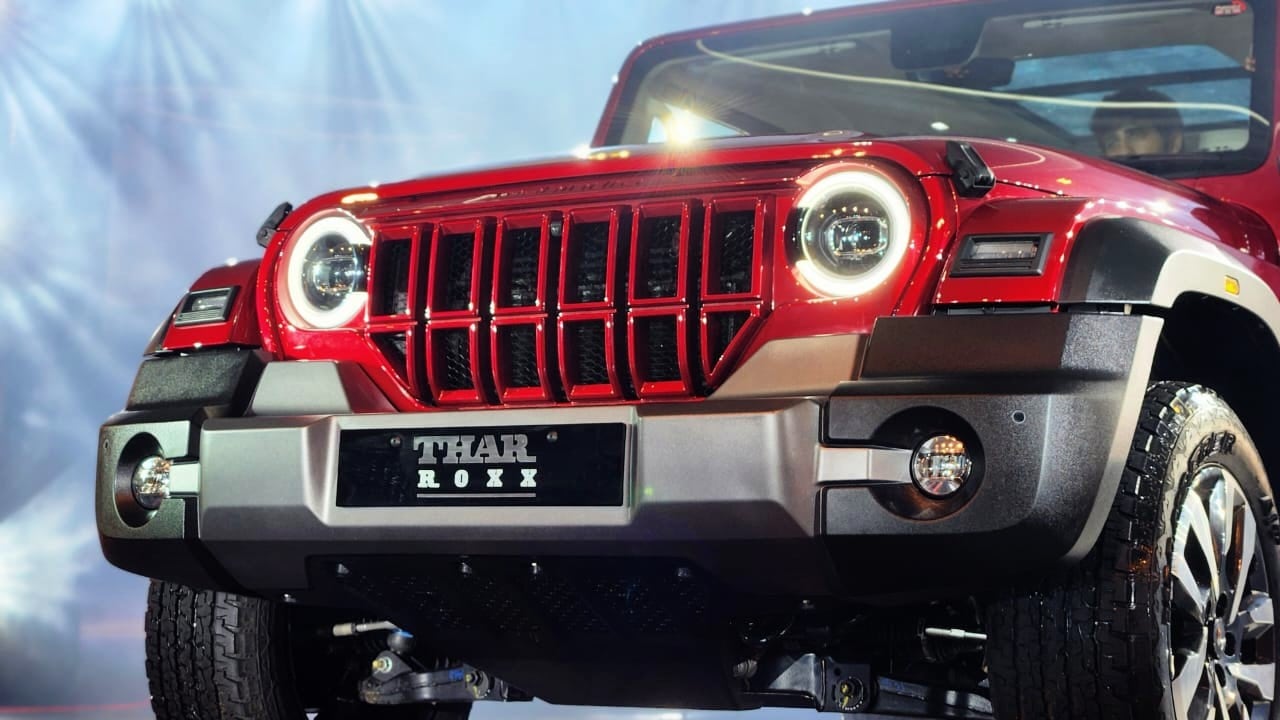 The Mahindra Thar Roxx gets distinctly different styling over the Thar 3-door with the new six-slat grille, LED headlamps with C-shaped DRLs, and fog lamps integrated into the bumpers