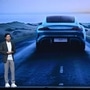 File photo: Xiaomi founder, chairman and CEO, Lei Jun speaks in front of an image of the Xiaomi SU7 car at an event where he also launched a new mobile phone in Beijing. (AFP)