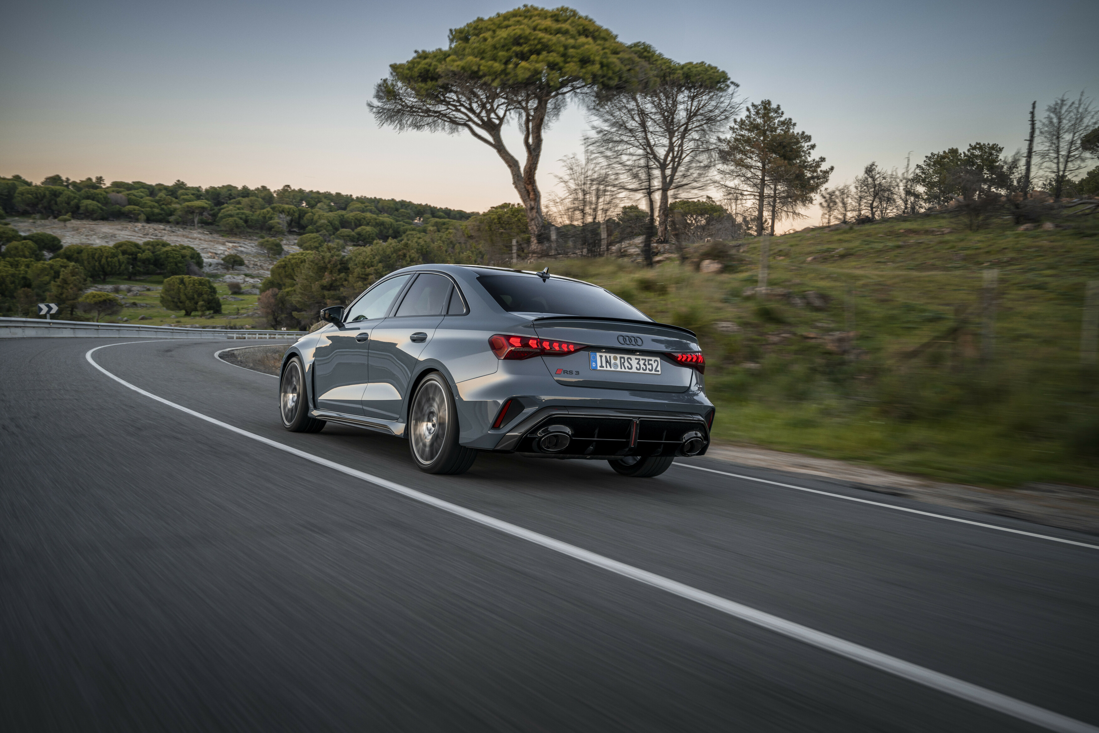 The 2025 Audi RS3 gets an updated rear fascia with new taillight graphics, vertical side reflectors, and new tailpipes. 