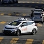 Cruise, the robotaxi unit under General Motors, will start offering its autonomous vehicles on the ride-hailing platform Uber from next year. | File photo: A self-driving GM Bolt EV seen during a media event.  (REUTERS)