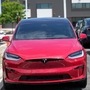 Tesla has issued a recall for approximately 9,100 Model X SUVs over a roof trim issue that may cause cosmetic pieces to separate and fly off the car, leading to road hazards for other drivers.  (AP)